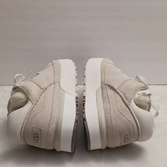 UGG size 11 men's cream and tan casual platfrom sneakers.